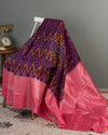 A purple kanchi soft silk saree with peach pink border