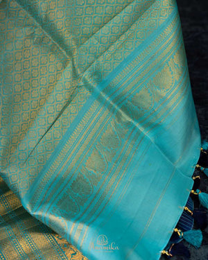Timeless Gadwal Pattu saree in deep navy and teal blue