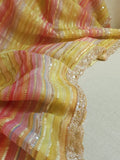 Multi colored pink hued Georgette saree with sequins border
