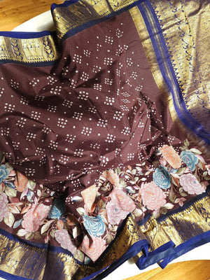 Kanjeevaram in a beautiful shade of brown with a dark blue border