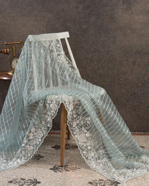 Pastel blue organza saree with all over pearl and sequins work