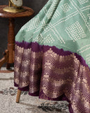 Sage Green Kanchi Bandini saree with a stunning purple border