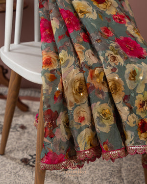 Grey Floral Chinnon saree with a contrast handwork blouse