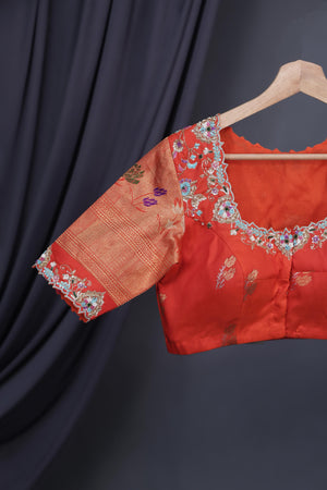 Aqua blue Gadwal saree with meenakari floral border in orange