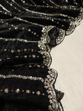 Falling organza saree in black with all over sequins work