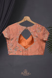 Crushed tissue saree in peach with beautiful cutwork border