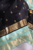 Kanjeevaram in black and sea green combination