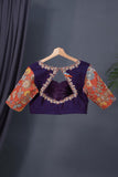 Deep purple bandini saree with a hand painted kalamkari border