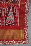 Patan Patola saree with intricately designed maggam work border