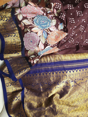 Kanjeevaram in a beautiful shade of brown with a dark blue border