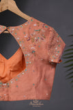 Crushed tissue saree in peach with beautiful cutwork border