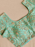 Light Blue kanjeevaram saree with a heavy embroidered blouse