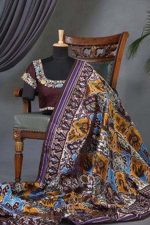 Timeless Ikkat patola elegance in rich chocolate brown