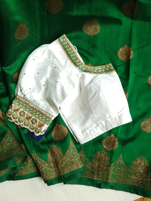 Banarasi Dupion saree in dark green with gold Zari border and motifs