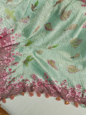 Crush tissue saree in aqua green with floral cutwork border