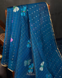 Muslin jamdaani saree in a beautiful peacock blue shade