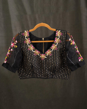 Muslin jamdaani saree in black with all over floral weave