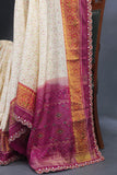 Patan Patola saree with intricately designed maggam work border