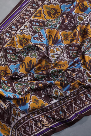 Timeless Ikkat patola elegance in rich chocolate brown