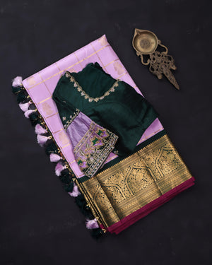 Gadwal kanchi saree in a beautiful lavender and emerald green combo