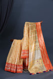 Banarasi Kora silk in a luxurious golden cream and orange border