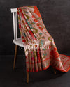 Orange Tusser Georgette saree with all over floral and paithani weave