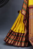 Gadwal Pattu saree in yellow and brown