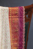Patan Patola saree with intricately designed maggam work border