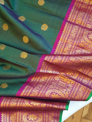 Peacock Green Gadwal Kanchi Saree with a magenta pink border