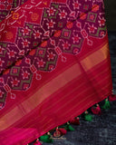 Pure Patola silk saree in a lovely shade of green and pink