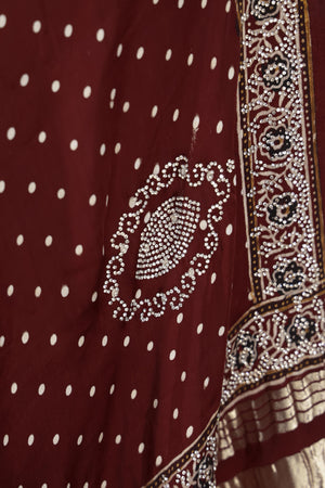 Deep wine modal silk ajrak saree with hand work border