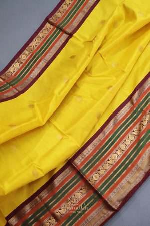 Gadwal Pattu saree in yellow and brown