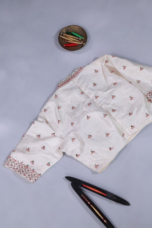 Elegant Crush Tissue saree in peach pink with a stunning mirror work blouse