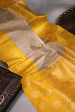 Kanjeevaram Tissue saree in silver and yellow