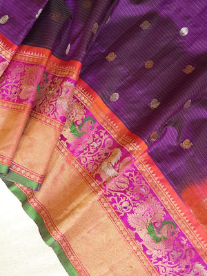 A Royal Gadwal kanchi saree in purple with contrast turning meena border