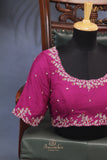 Patan Patola saree with intricately designed maggam work border