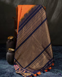 Deep orange Gadwal saree with handcrafted kalamkari appliqué work Border
