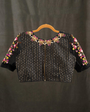 Muslin jamdaani saree in black with all over floral weave