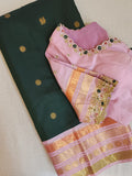 Kanjeevaram saree in bottle green with a baby pink border