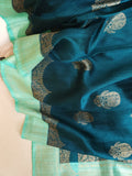 Peacock Green with aqua blue rawsilk saree with a stylish blouse