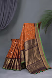 Rich kanjeevaram saree in rust orange and brown border