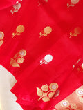 Red organza saree with a contrast blue work blouse