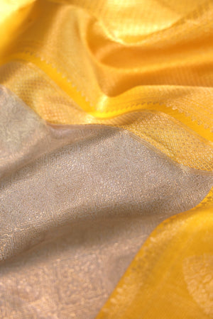 Kanjeevaram Tissue saree in silver and yellow