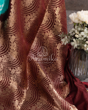 Blue Kanchi Bandini saree with a stunning brown border