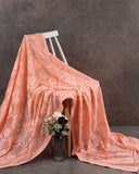 Peach Chikankari Georgette saree with an all over sequins blouse