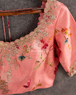 Red Georgette saree with a contrast peach floral blouse