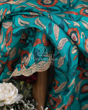 Blue Crepe Silk saree with digital kalamkari print and a beautiful mirror work border