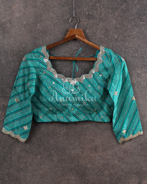 Blue Crepe Silk saree with digital kalamkari print and a beautiful mirror work border