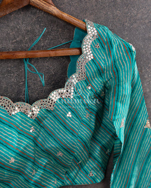 Blue Crepe Silk saree with digital kalamkari print and a beautiful mirror work border