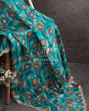 Blue Crepe Silk saree with digital kalamkari print and a beautiful mirror work border